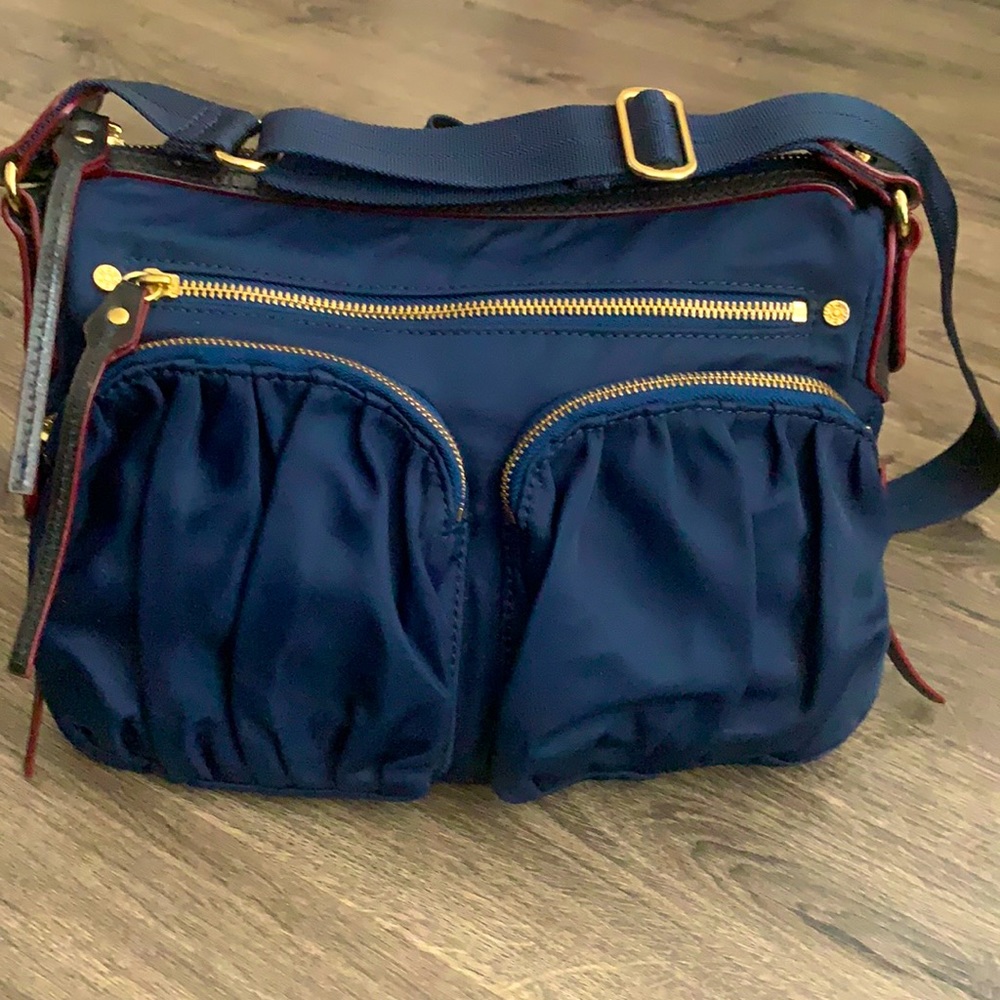 MZ Wallace Navy Crossbody Bag with Gold Hardware and Red Trim